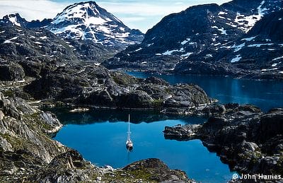 Aluminum expedition sailboat Morgan's Cloud at anchor in Caroline Amalies Havn, Skjoldungen, Southeast Greenland