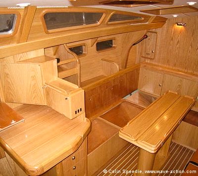 The OVNI 435 aluminum sailboat interior layout showing woodwork