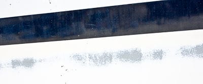 Waterline bottom paint failure on aluminum expedition sailboat Morgan's Cloud