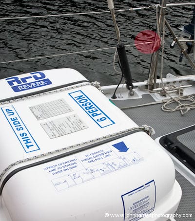 The Revere liferaft in its mounting on the aft deck of aluminum expedition sailboat Morgan's Cloud