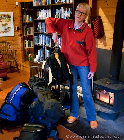 Phyllis weighing luggage in preparation for our trip to look after aluminum expedition sailboat Polaris near Aasiaat on the Greenland West Coast