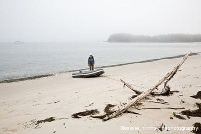 Phyllis And Dinghy On The Beach With Morgan's Cloud Anchored In the Background