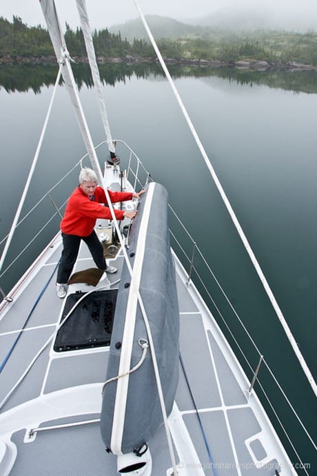 Phyllis moves the Avon dinghy on S/V Morgan's Cloud's foredeck