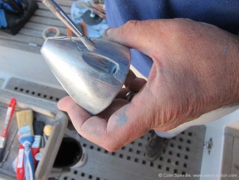 Anodes for most of these feathering props are essential, but very expensive. They're also prone to corroding away around the stainless machine screws that attach the anode to the bronze boss, falling off long before the anode itself is fully wasted. Preparing them beforehand with paint in and around the screw holes cures this - epoxy paint is ideal.