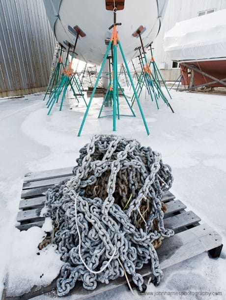 "Morgan's Cloud" on the hard at Billings Diesel and Marine in Stonington, Maine, with a pile of anchor chain frozen to a pallet at her bow during one of the three winters we spent at Billings refitting the boat. "Morgan's Cloud" on the hard at Billings Diesel and Marine in Stonington, Maine, with a pile of anchor chain frozen to a pallet at her bow during one of the three winters we spent at Billings refitting the boat.