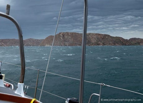 Morgan's Cloud riding out a blow at anchor just outside of Upernavik, West Greenland JHH5II-12146