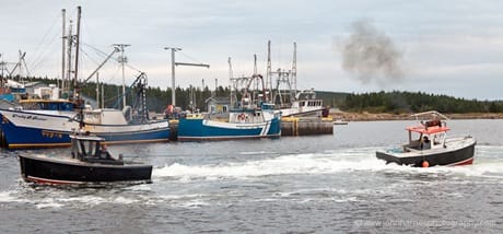 Two herring seine boats having a tug of war JHH5II-12617