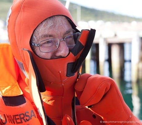 Crew trying on survival suit JHH5II-12534