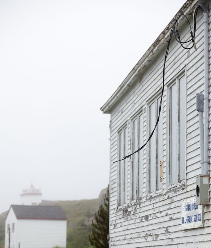 Outside of Grand Bruit Newfoundland All Grade School showing cut power lines