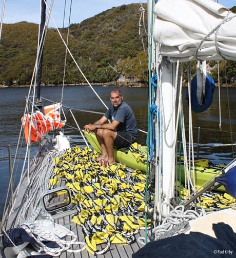 Paul with the Jordan Series Drogue on the deck of sailboat Midnight Sun in harbour Drouge on Deck