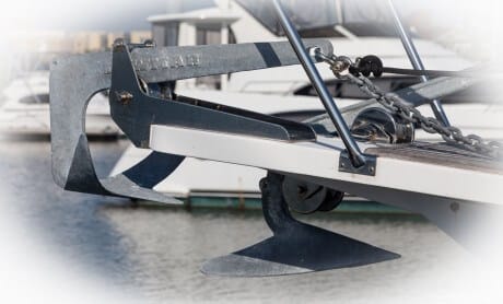 Boat bow with two anchors on bow rollers