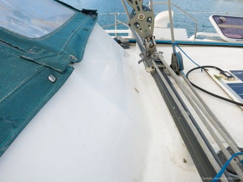 Detail of wave break in front of cockpit showing attachment of canvas dodger Untitled-2